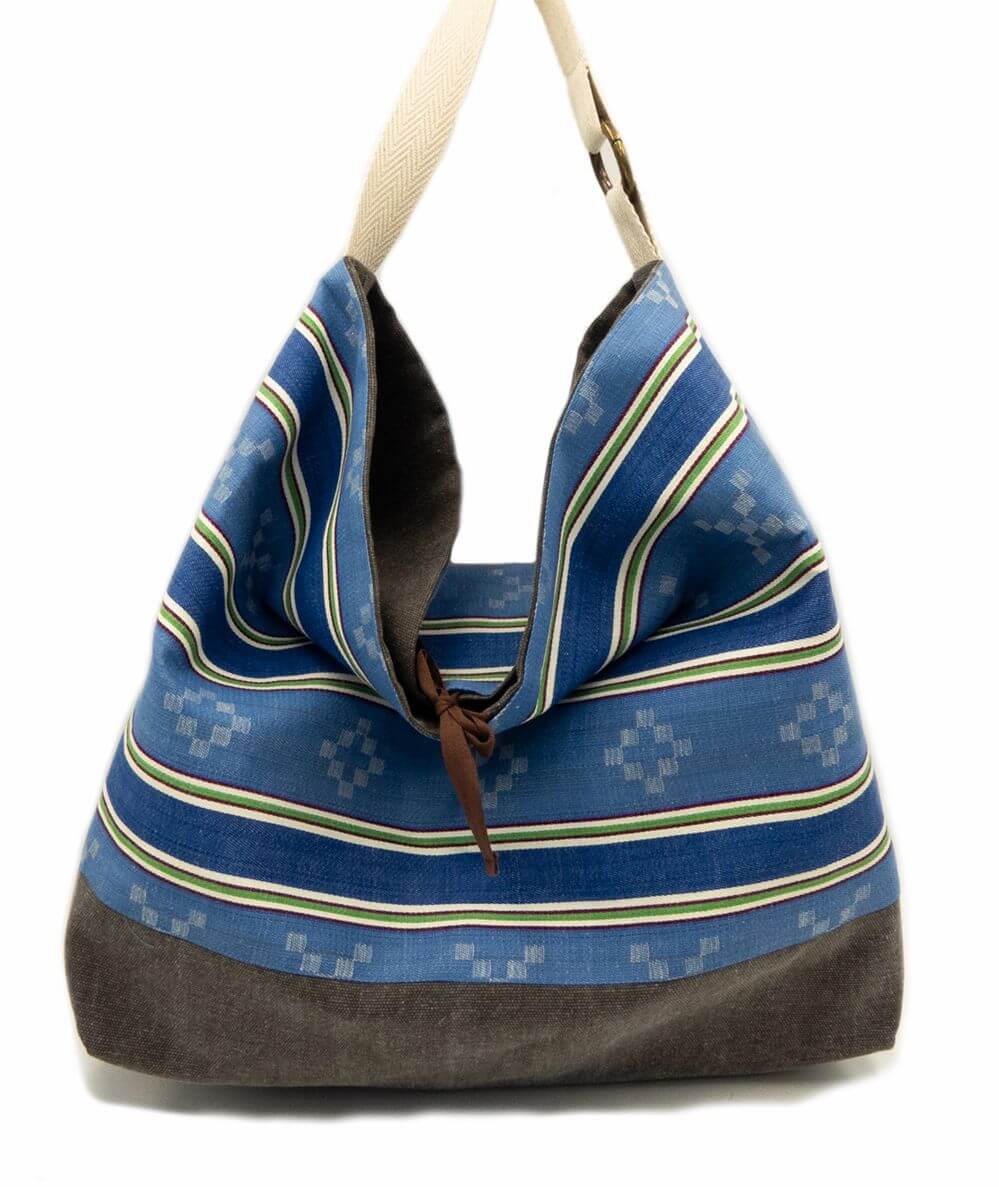 Blue bag with geometric print made in Bilbao with old mattress fabric
