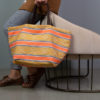 Reversible carrycot bag made with an old orange mattress fabric