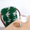 manta de lana merino con estampado de golondrinas en verde