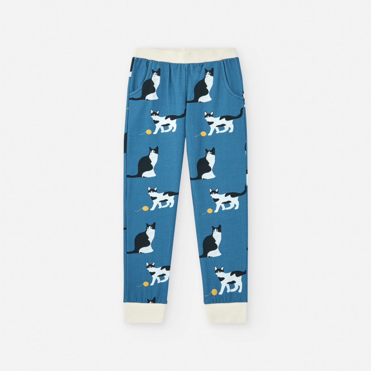 pantalon azul con estampado de gatos